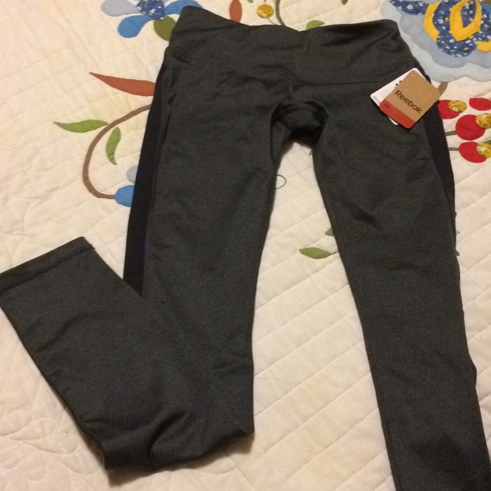 Reebok stretch leggings with zip pocket